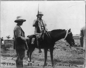 Roosevelt in Africa on horse with gun