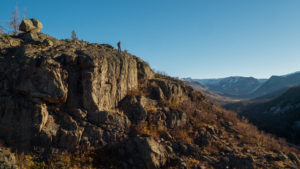 Patrick atop some cliffs
